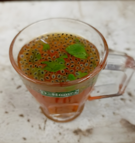 Elaichi Chai with soft cardamom aroma in a pastel cup